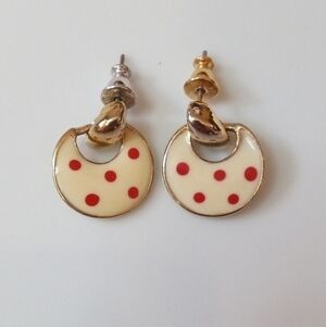 Gold toned enamel crescent cream colored with red polka dot post earrings